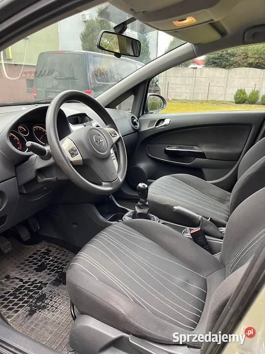 Używany Opel Corsa 90 KM (66 kW) 2007 Srebrny Hatchback