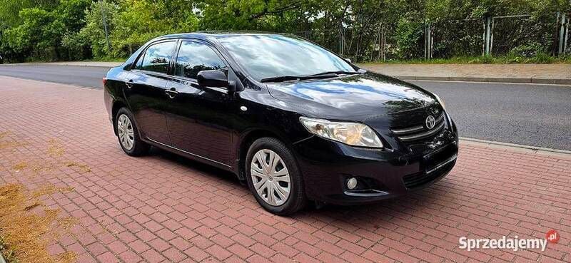 Czarny Używany 2010 Toyota Corolla Sedan/Limuzyna | 26 950 zł (Uczciwa cena) - Obraz 1/4