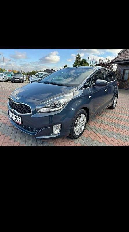 Szary Używany 2013 Kia Carens Minivan | 32 900 zł - Obraz 1/4