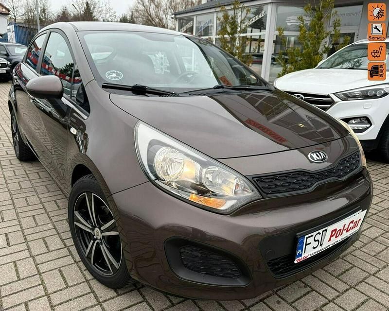 Brązowobeżowy Używany 2013 Kia Rio Hatchback | 27 900 zł (Dość drogi) - Obraz 1/4