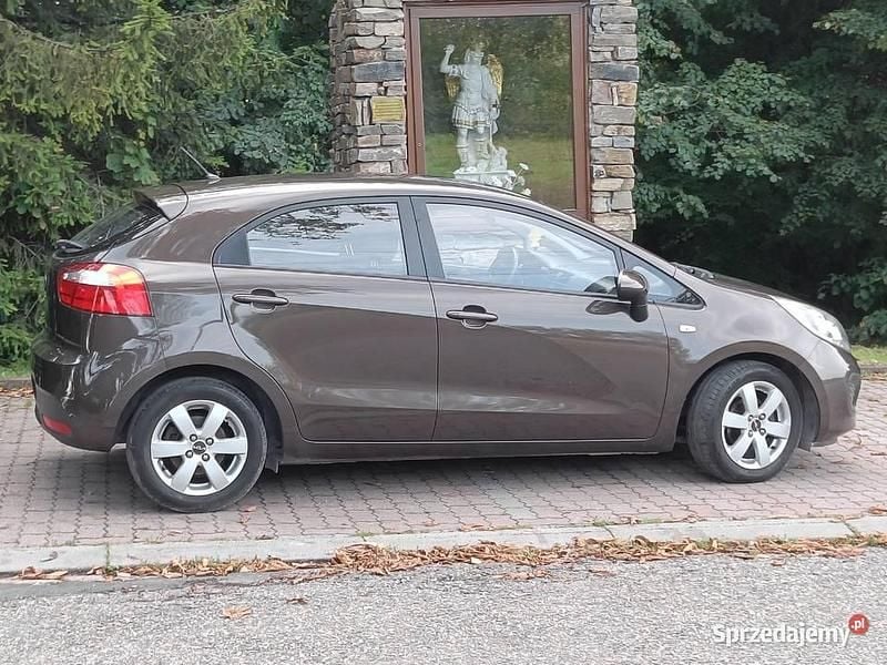 Brązowy Używany 2013 Kia Rio Hatchback | 24 700 zł (Uczciwa cena) - Obraz 1/4