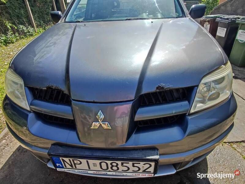 Używany Mitsubishi Outlander Comfort Edition 136 KM (100 kW) 2007 Srebrny SUV