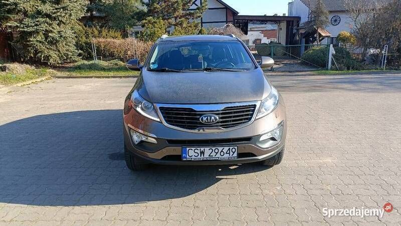 Brązowy Używany 2013 Kia Sportage 2 SUV | 43 900 zł (Uczciwa cena) - Obraz 1/4