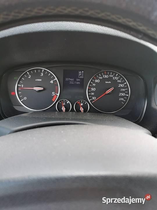 Czerwony Używany 2012 Renault Laguna III Kombi | 18 000 zł (Uczciwa cena) - Obraz 1/4