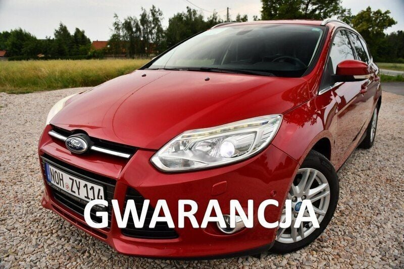 Używany Ford Focus 125 KM (91 kW) 2013 Bordowy (metalik, perła) Kombi