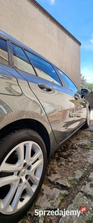 Szary Używany 2017 Opel Astra Kombi | 26 700 zł (Uczciwa cena) - Obraz 1/4