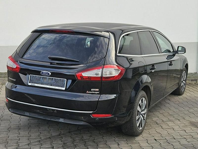 Używany Ford Mondeo 140 KM (102 kW) 2011 Czarny Kombi