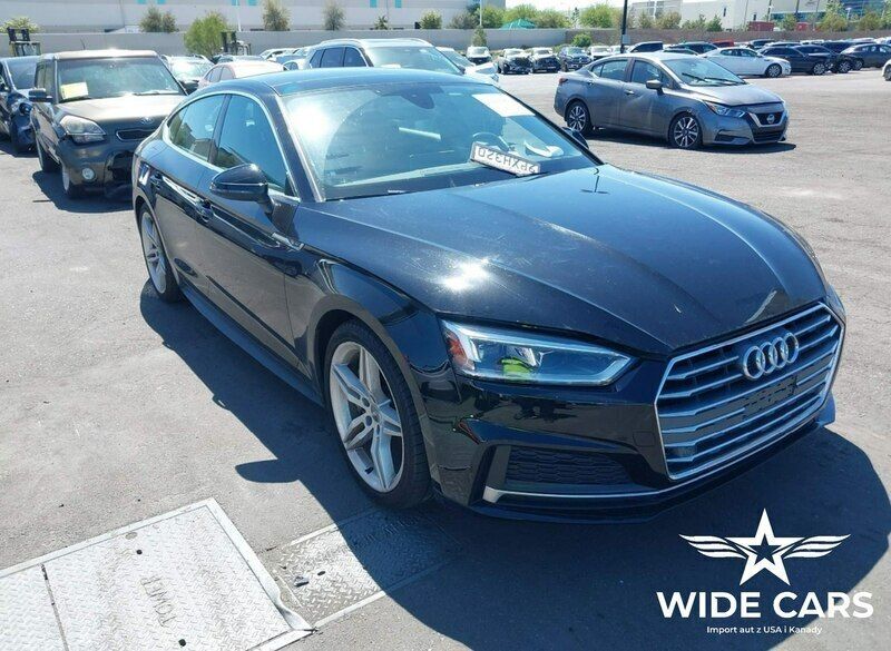 Czarny (metalik) Używany 2019 Audi A5 Coupe | 55 700 zł - Obraz 1/4