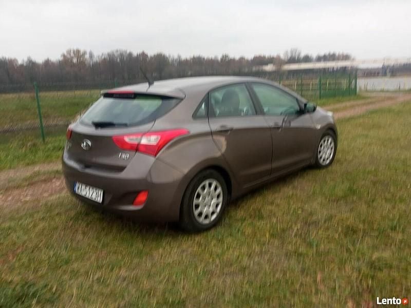 Brązowobeżowy Używany 2013 Hyundai i30 Hatchback | 30 000 zł (Uczciwa cena) - Obraz 1/4