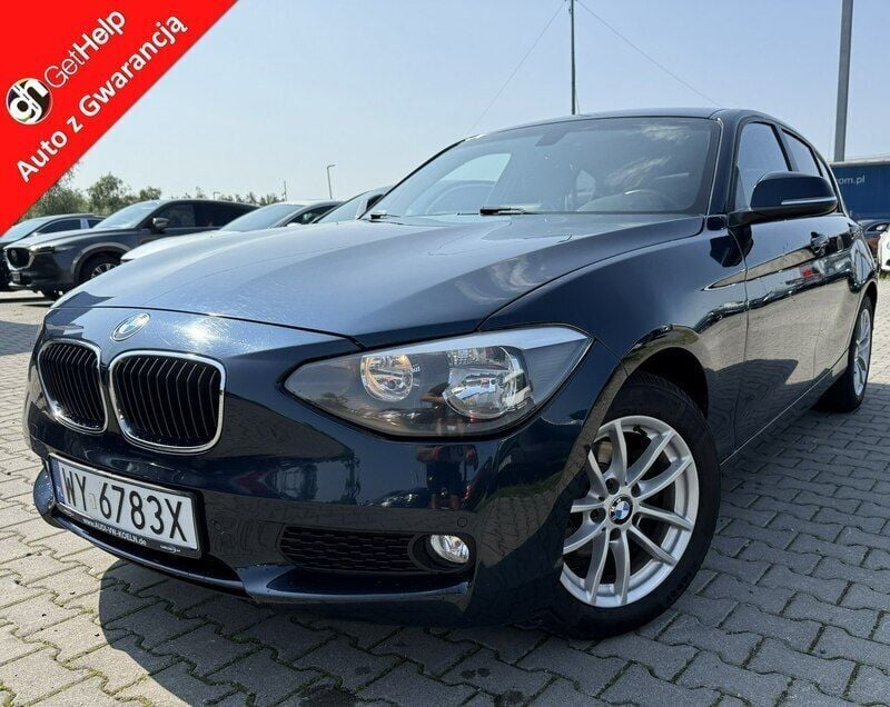 Niebieski ciemny (metalik) Używany 2012 BMW 118 Hatchback | 32 900 zł (Drogi) - Obraz 1/4