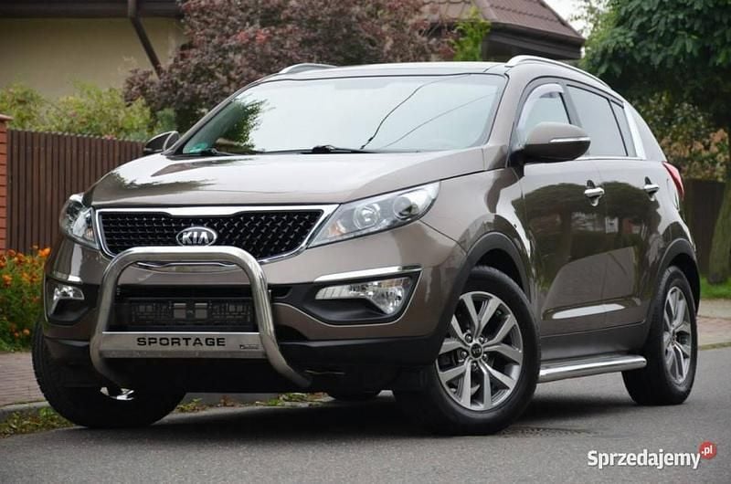 Brązowy Używany 2014 Kia Sportage SUV | 38 900 zł (Uczciwa cena) - Obraz 1/4