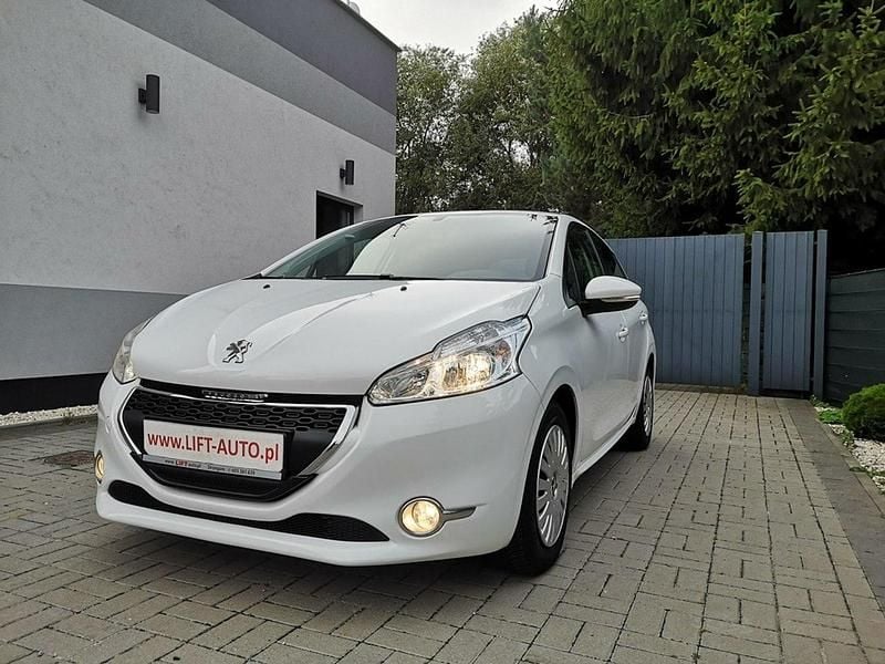 Biały Używany 2013 Peugeot 208 Hatchback | 19 900 zł (Uczciwa cena) - Obraz 1/4
