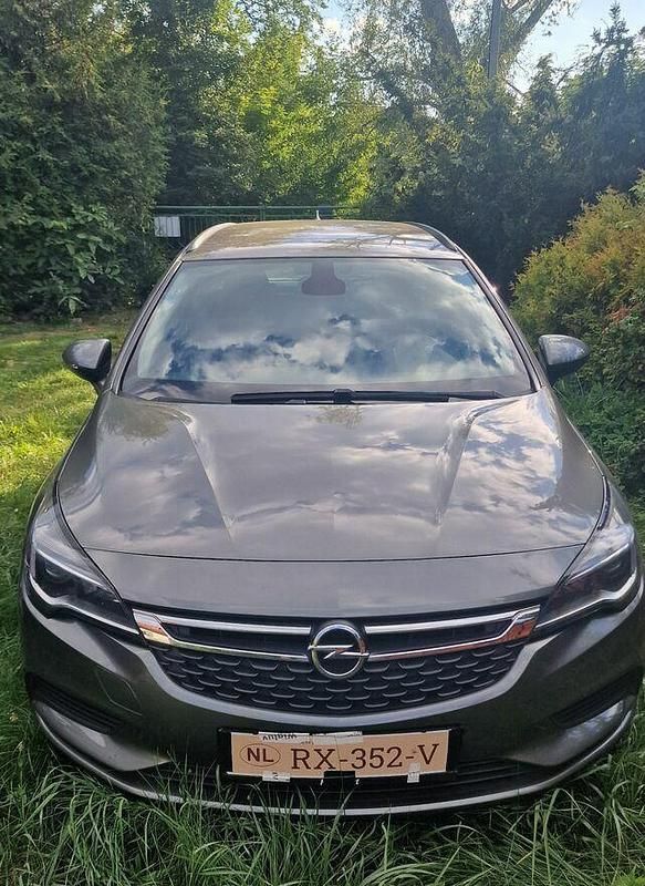 Szary Używany 2018 Opel Astra Active Kombi | 29 900 zł (Uczciwa cena) - Obraz 1/4