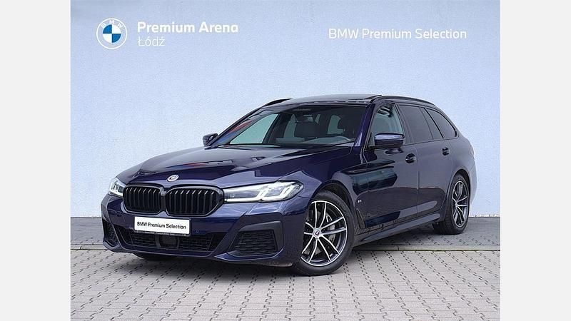 Niebieski tanzanite bmw individual metalizowany Używany 2022 BMW 530 Shadowline Kombi | 159 900 zł (Super Cena) - Obraz 1/3