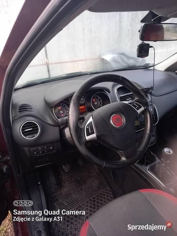 Bordowy Używany 2012 Fiat Punto Sedan/Limuzyna | 11 000 zł - Obraz 1/4