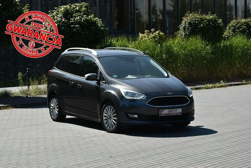 Grafitowy (metalik) Używany 2018 Ford Grand C-Max Minivan | 42 900 zł - Obraz 1/4