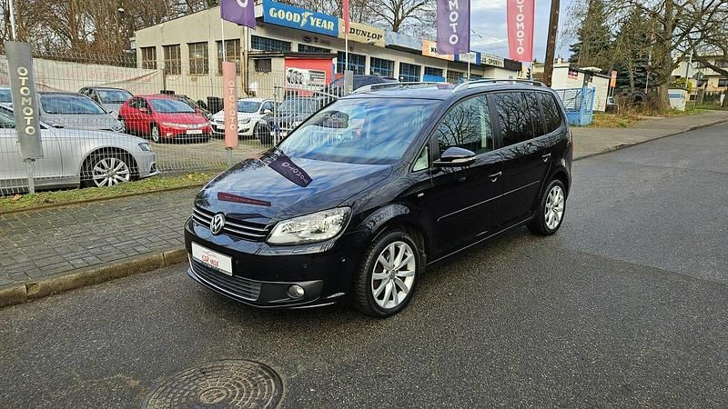 Używany VW Touran 105 KM (77 kW) 2014 Czarny Minivan