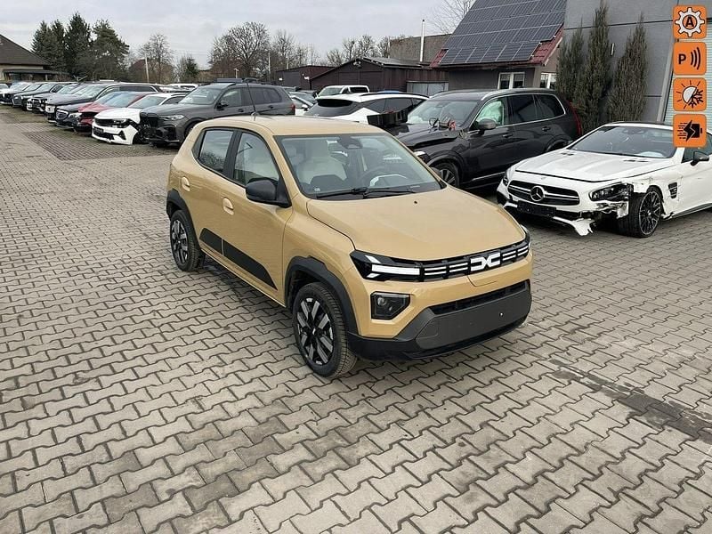 Złoty (metalik) Używany 2025 Dacia Spring Hatchback | 39 900 zł - Obraz 1/4