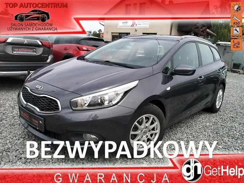 Czerwony Używany 2013 Kia Ceed 2 Coupe | 21 500 zł (Uczciwa cena) - Obraz 1/4