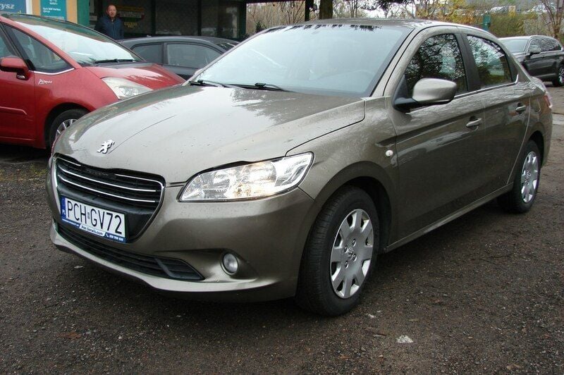Bordowy Używany 2013 Peugeot 301 Sedan/Limuzyna | 22 900 zł - Obraz 1/4