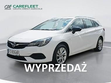 Biały Używany 2021 Opel Astra Elegance Kombi | 47 800 zł (Uczciwa cena) - Obraz 1/4