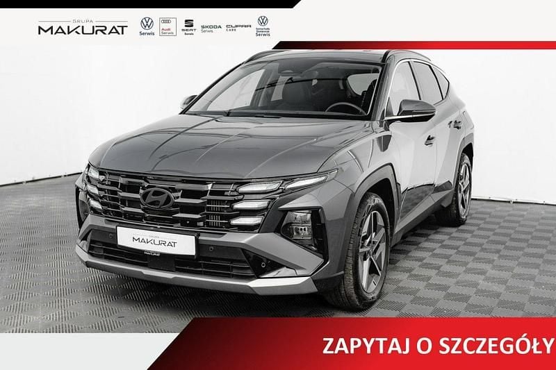 Szary Używany 2024 Hyundai Tucson SUV | 139 850 zł (Dość drogi) - Obraz 1/4