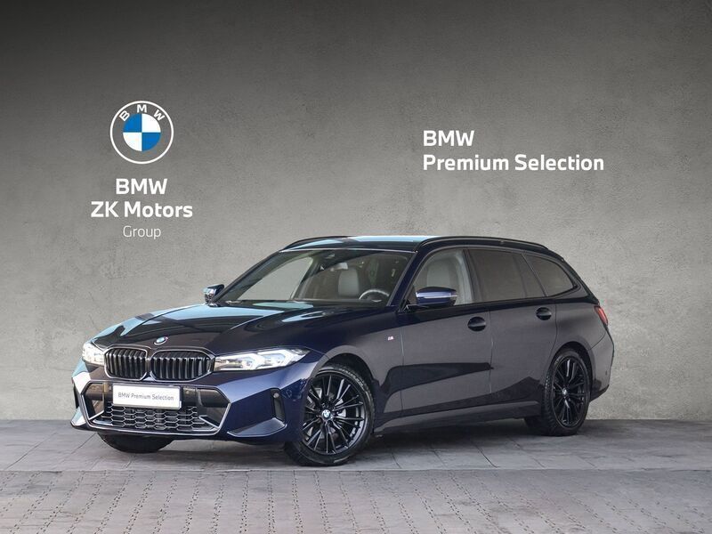 Niebieski tanzanite bmw individual metalizowany Używany 2023 BMW 320 Comfort Edition Kombi | 213 500 zł - Obraz 1/4