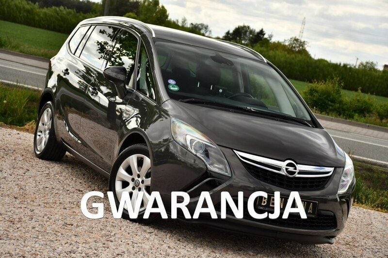 Grafitowy (metalik, perła) Używany 2013 Opel Zafira Minivan | 27 999 zł (Uczciwa cena) - Obraz 1/4