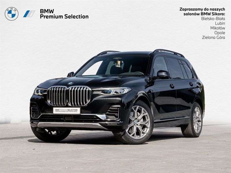 Czarny szafir metalizowany Używany 2021 BMW X7 Comfort Edition SUV | 299 900 zł - Obraz 1/3