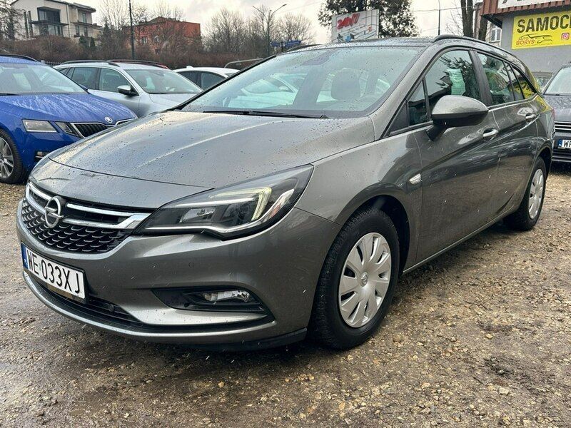 Szary (metalik) Używany 2019 Opel Astra Kombi | 41 900 zł (Uczciwa cena) - Obraz 1/4