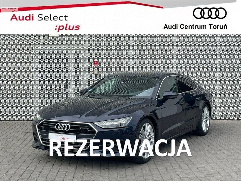 Niebieski ciemny (metalik) Używany 2022 Audi A7 Hatchback | 399 900 zł - Obraz 1/4