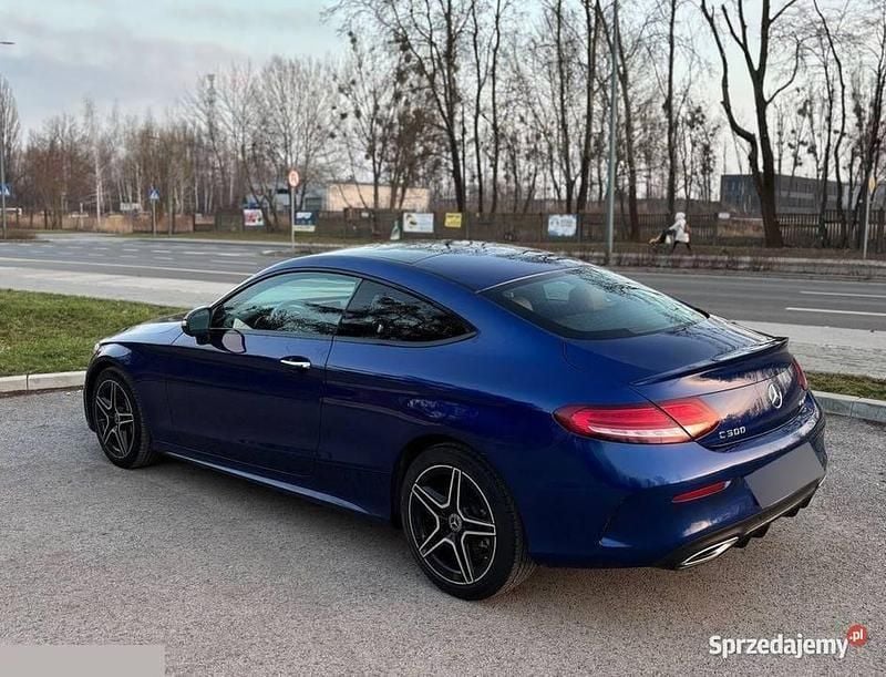 Niebieski Używany 2020 Mercedes C300 AMG line Coupe | 210 000 zł - Obraz 1/4