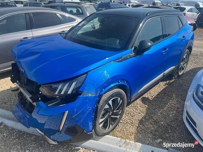 Niebieski Używany 2023 Peugeot e-2008 GT SUV | 41 600 zł - Obraz 1/4