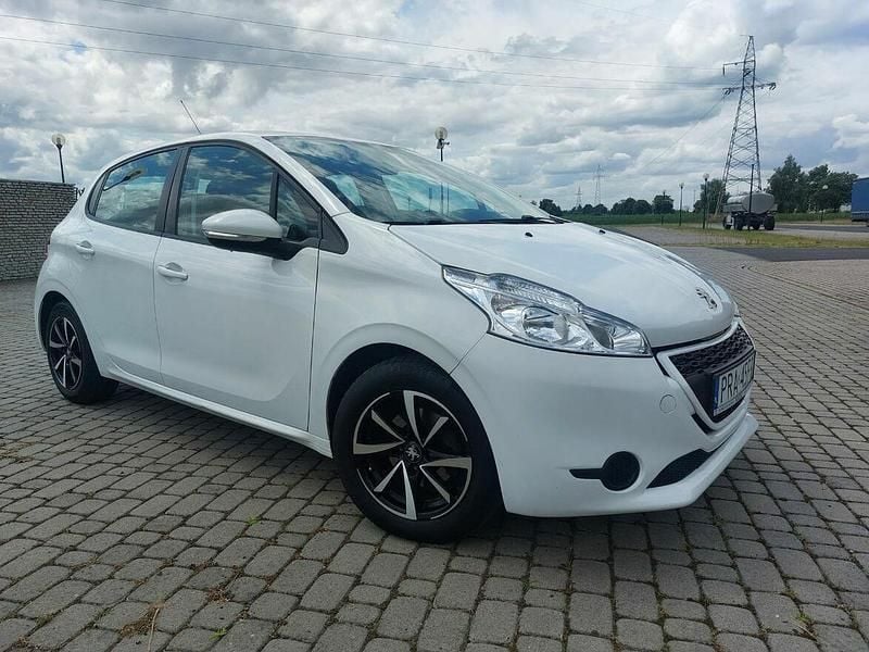 Biały Używany 2015 Peugeot 208 Active Hatchback | 23 900 zł (Uczciwa cena) - Obraz 1/4