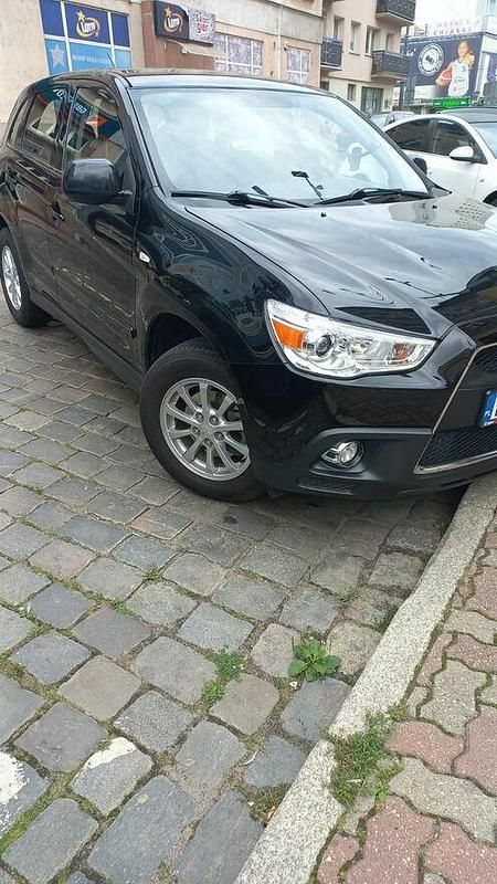 Używany Mitsubishi ASX 150 KM (110 kW) 2011 Czarny SUV