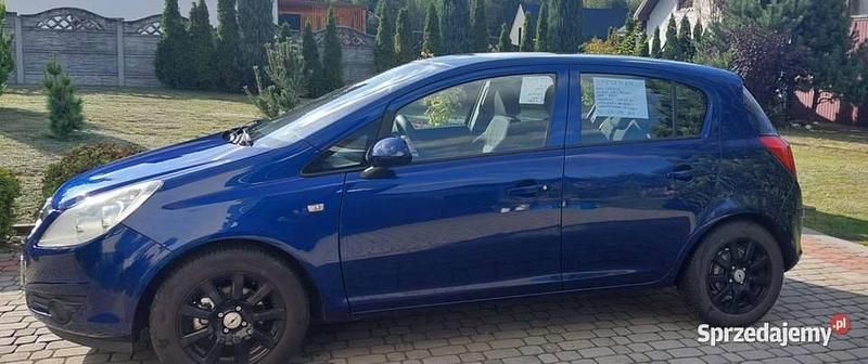 Granatowy Używany 2009 Opel Corsa Hatchback | 8900 zł (Uczciwa cena) - Obraz 1/4