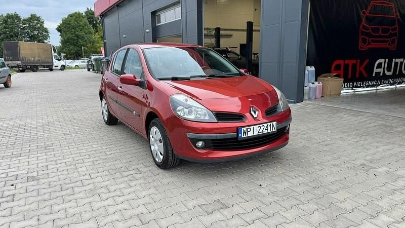Pomarańczowy (metalik) Używany 2006 Renault Clio II Hatchback | 12 500 zł (Drogi) - Obraz 1/4