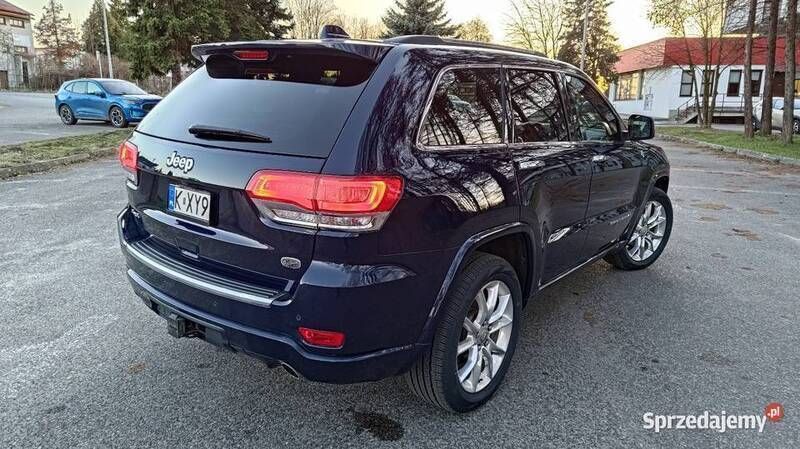 Granatowy Używany 2014 Jeep Grand Cherokee Overland SUV | 75 500 zł - Obraz 1/4