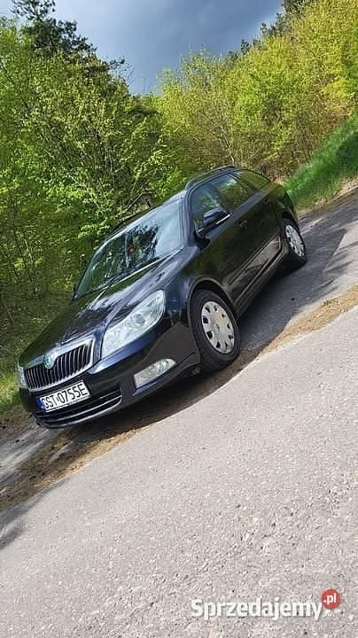 Czarny Używany 2012 Skoda Octavia Kombi | 17 900 zł - Obraz 1/4
