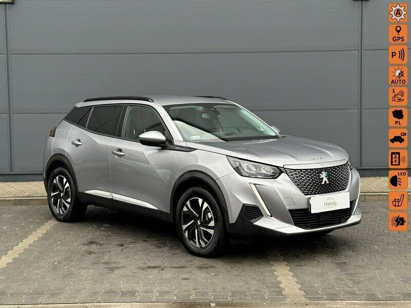 Grafitowy (metalik) Używany 2021 Peugeot e-2008 SUV | 98 500 zł - Obraz 1/4