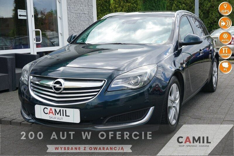 Zielony (metalik) Używany 2014 Opel Insignia Kombi | 27 800 zł (Uczciwa cena) - Obraz 1/3