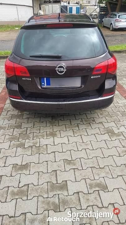 Brązowy Używany 2014 Opel Astra Kombi | 21 000 zł (Dobra cena) - Obraz 1/4