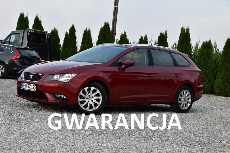 Wiśniowy Używany 2014 Seat Leon Kombi | 29 900 zł (Uczciwa cena) - Obraz 1/4