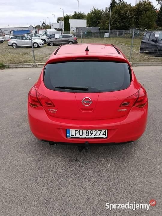 Czerwony Używany 2010 Opel Astra Hatchback | 14 500 zł (Uczciwa cena) - Obraz 1/4