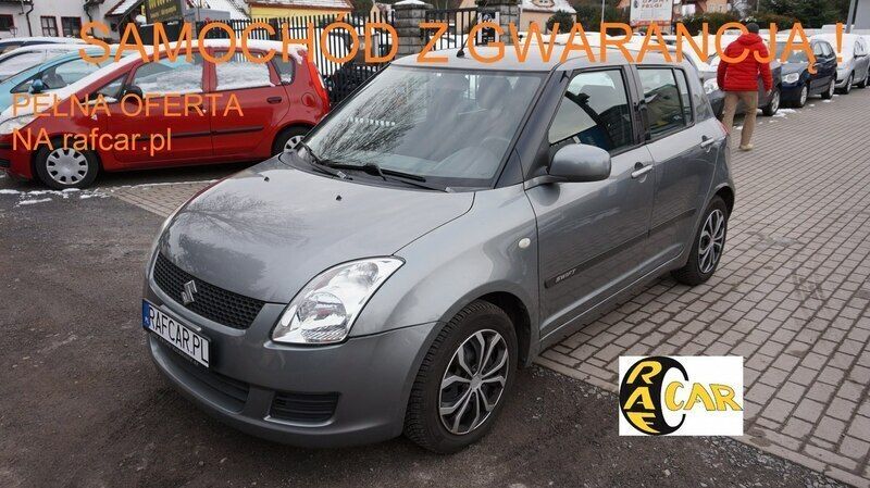 Szary (metalik) Używany 2009 Suzuki Swift Hatchback | 15 999 zł - Obraz 1/4