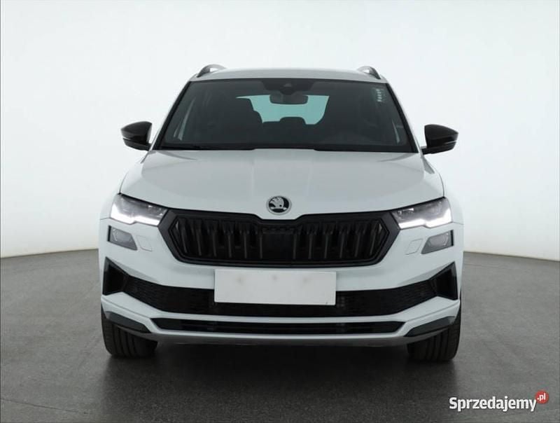 Biały Używany 2024 Skoda Karoq SUV | 139 999 zł (Drogi) - Obraz 1/4