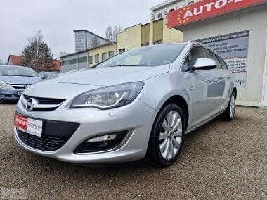 Używany Opel Astra Cosmo 115 KM (84 kW) 2015 Srebrny Sedan/Limuzyna