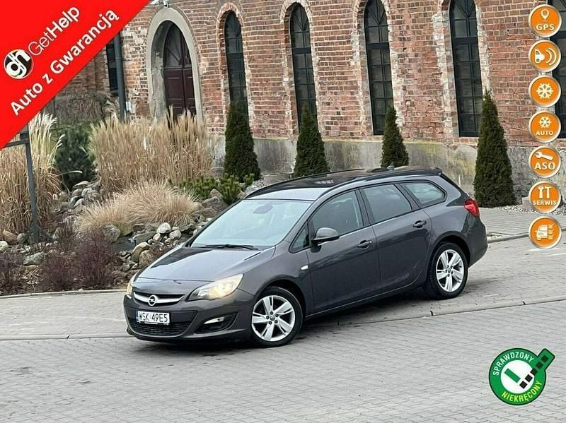 Szary Używany 2013 Opel Astra Sport Kombi | 25 900 zł (Uczciwa cena) - Obraz 1/4