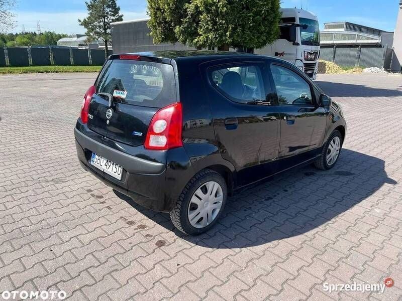 Używany Nissan Pixo 68 KM (50 kW) 2009 Czarny Hatchback