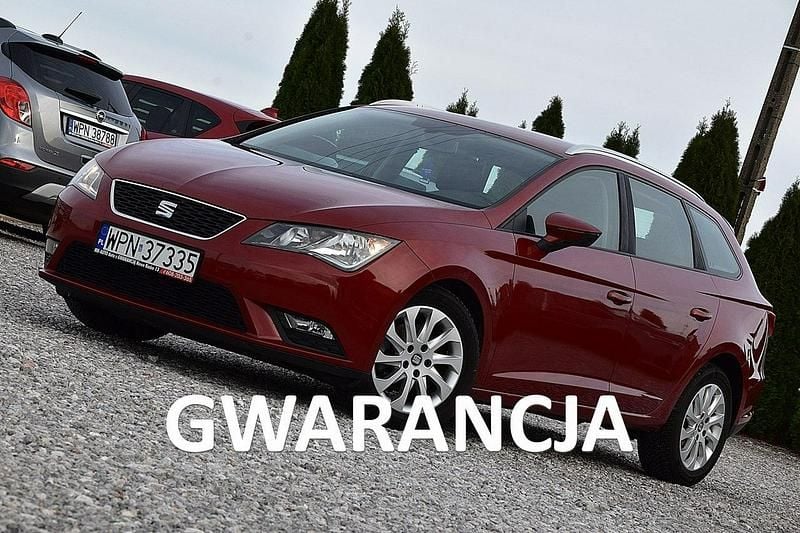 Wiśniowy Używany 2014 Seat Leon Kombi | 27 900 zł (Uczciwa cena) - Obraz 1/4